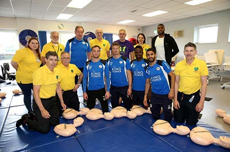 Leicester City footballers with CPR equipment