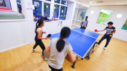 Picture of students playing table tennis