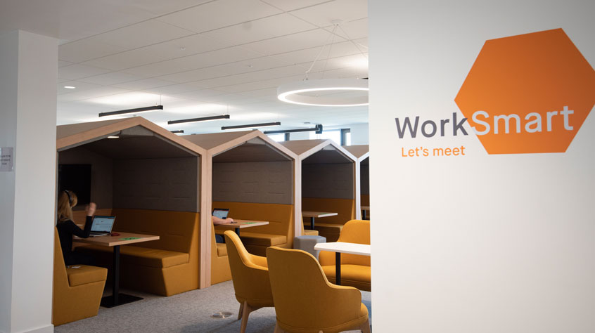 An open plan office with various styles of seating.