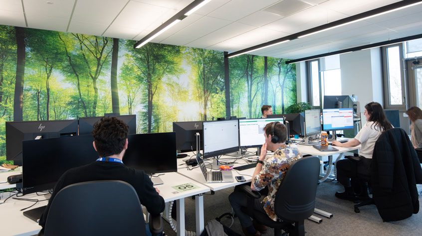 People working in an open plan office