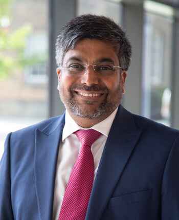 Black and white photo of Professor Nishan Canagarajah