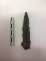 The point of a Roman pilum found in the defensive ditch. It is a degraded iron spearhead-type object.