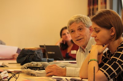 Two delegates during a discussion