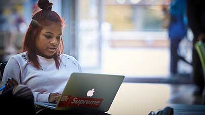student working on laptop