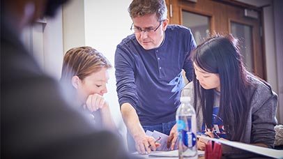 a tutor in class with some students