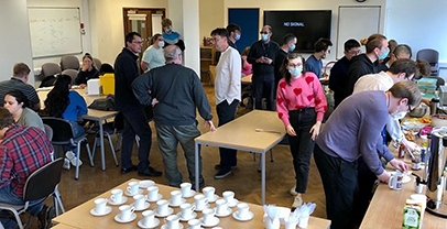 Pancake Day celebrations in the School of Chemistry, staff and students enjoying sweet treats together