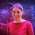 Photograph of Kirstin Gutekunst, standing in front of an abstract background.