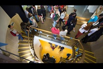 People congregating in a hallway
