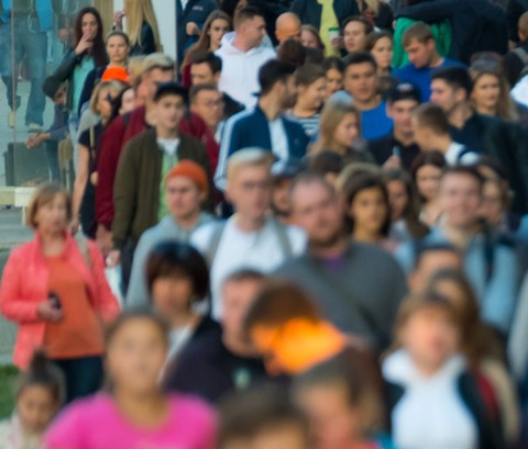 Crowd of people on the street. No recognizable faces