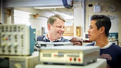 two people working together