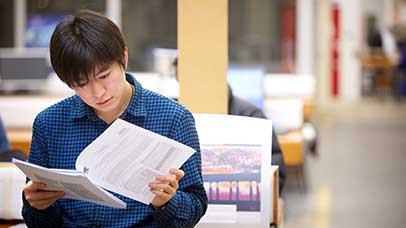 student reading course materials