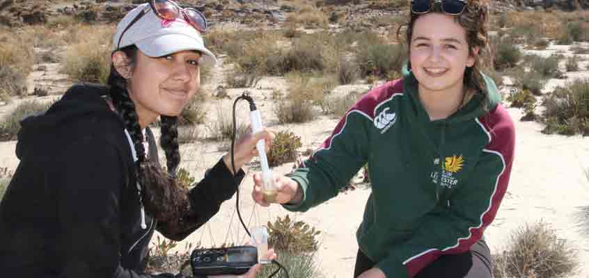 Female students using equipment on Spain fieldwork