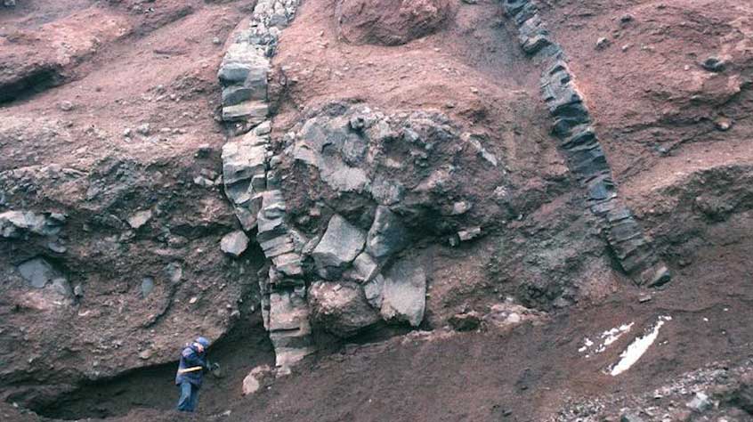 Basaltic dykes intruding basaltic scoria in a sequence within a volcanic arc volcano on Visokoi Island, South Sandwich Islands, South Atlantic.
