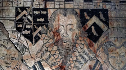 Medieval tomb with images of a man and two women