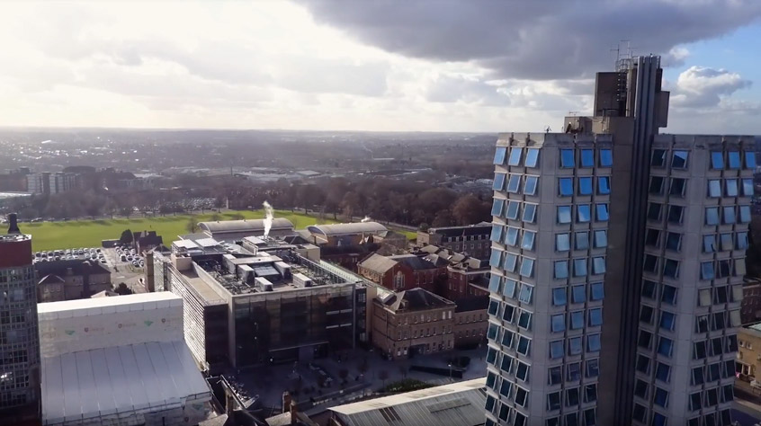 video still of aerial shot of campus
