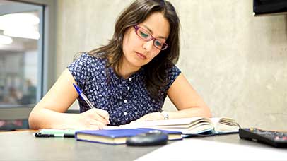 postgraduate student studying alone