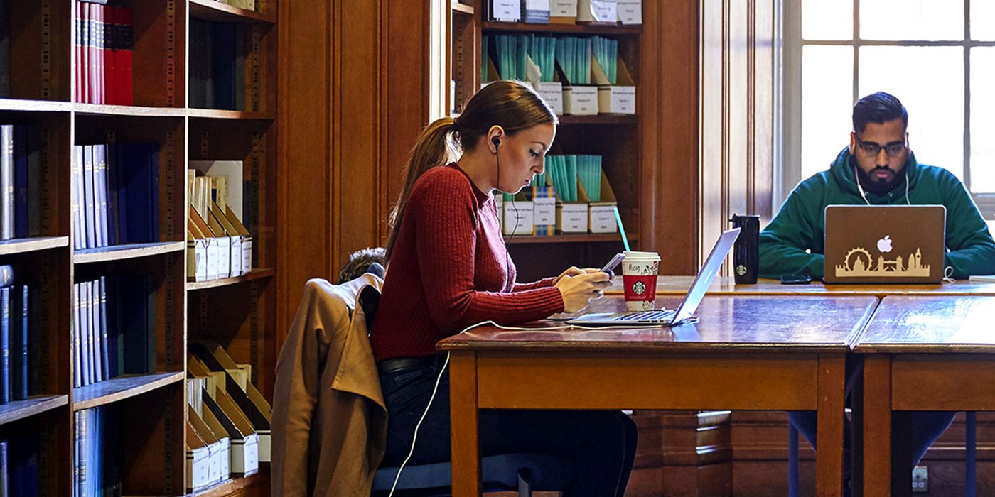 law students working in the law library