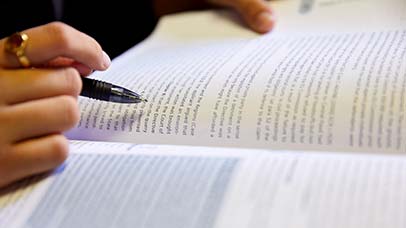 close up of someone study a book