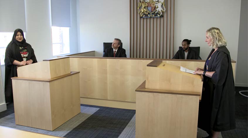 Students using the University of Leicester's moot court