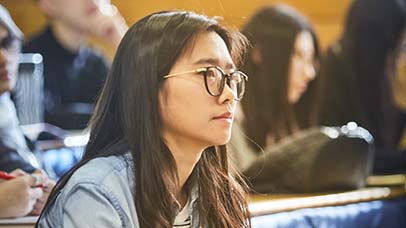 student listening in class