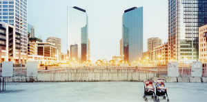 Francesco Jodice Francesco Jodice – Cartoline dagli altri spazi (1998) Photograph of a city landscape featuring symmetrical skyscrapers and bright street lighting horizontally through the centre of the image