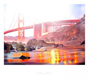 Image of Golden Gate Bridge, San Francisco taken from below near the shore with sunset reflecting on the water