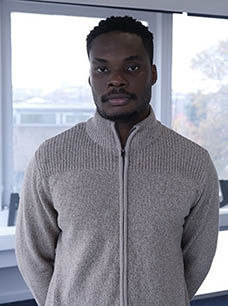 Emmanuel standing