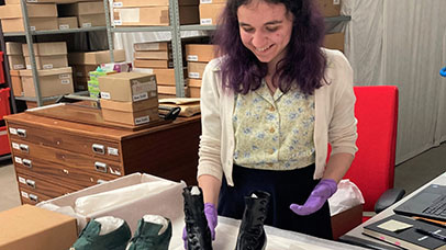 Sarah working with the shoe collection at Wakefield Museum