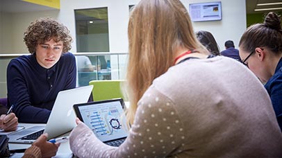 a group of undergraduate students working together