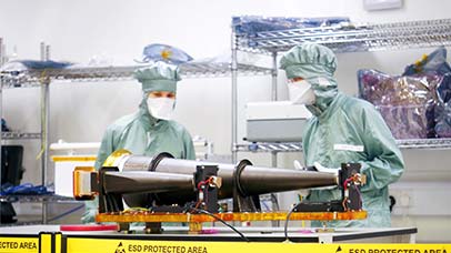 researchers using physics equipment