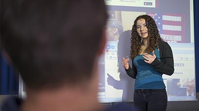 student presenting to a class