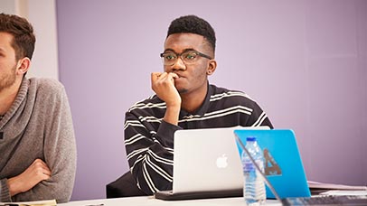 young student listening in class