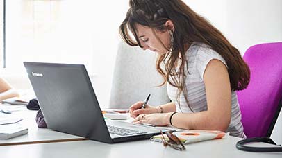 student working on laptop
