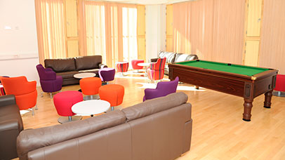 view of student common room with pool table