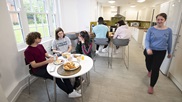 Students dining in the kitchen area