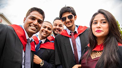 graduates celebrating together