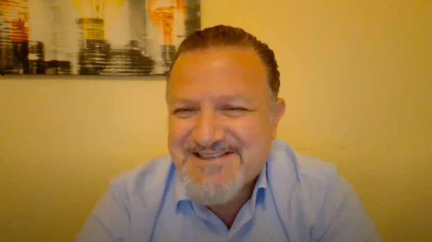 image of a man with beard smiling