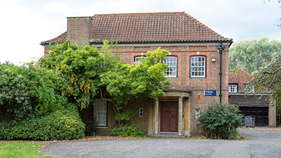 An external photo of the front of Southmeade House in The Village.