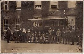 Staff and patients of the 5th Northern General Hospital outside the front door of the main building