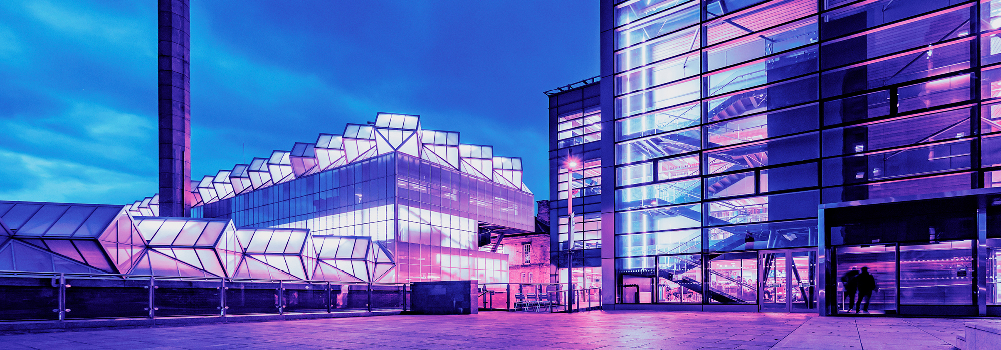 Image of University of Leicester campus buildings, including the David Wilson Library and Engineering Building