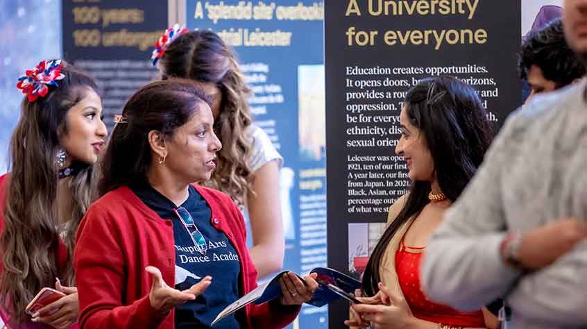 2/10/2021 - two women chatting at the ChangeMakers Centenary Festival