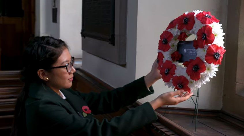Person holding a wreath