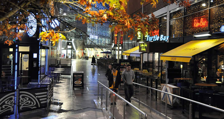 Students in Leicester city centre at night