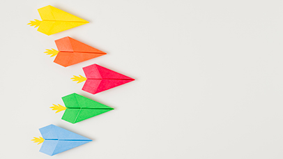 Photograph of colourful paper planes