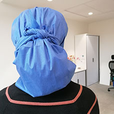 Back view of tied scrub cap