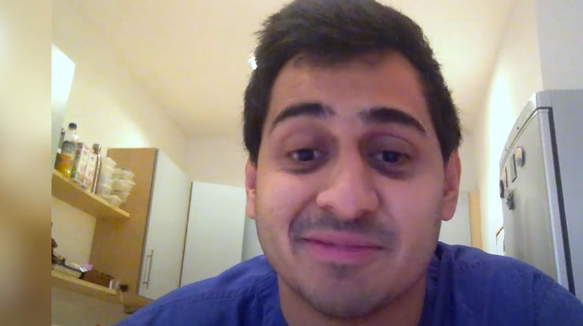 Student Kishan wearing a blue top and looking into the camera