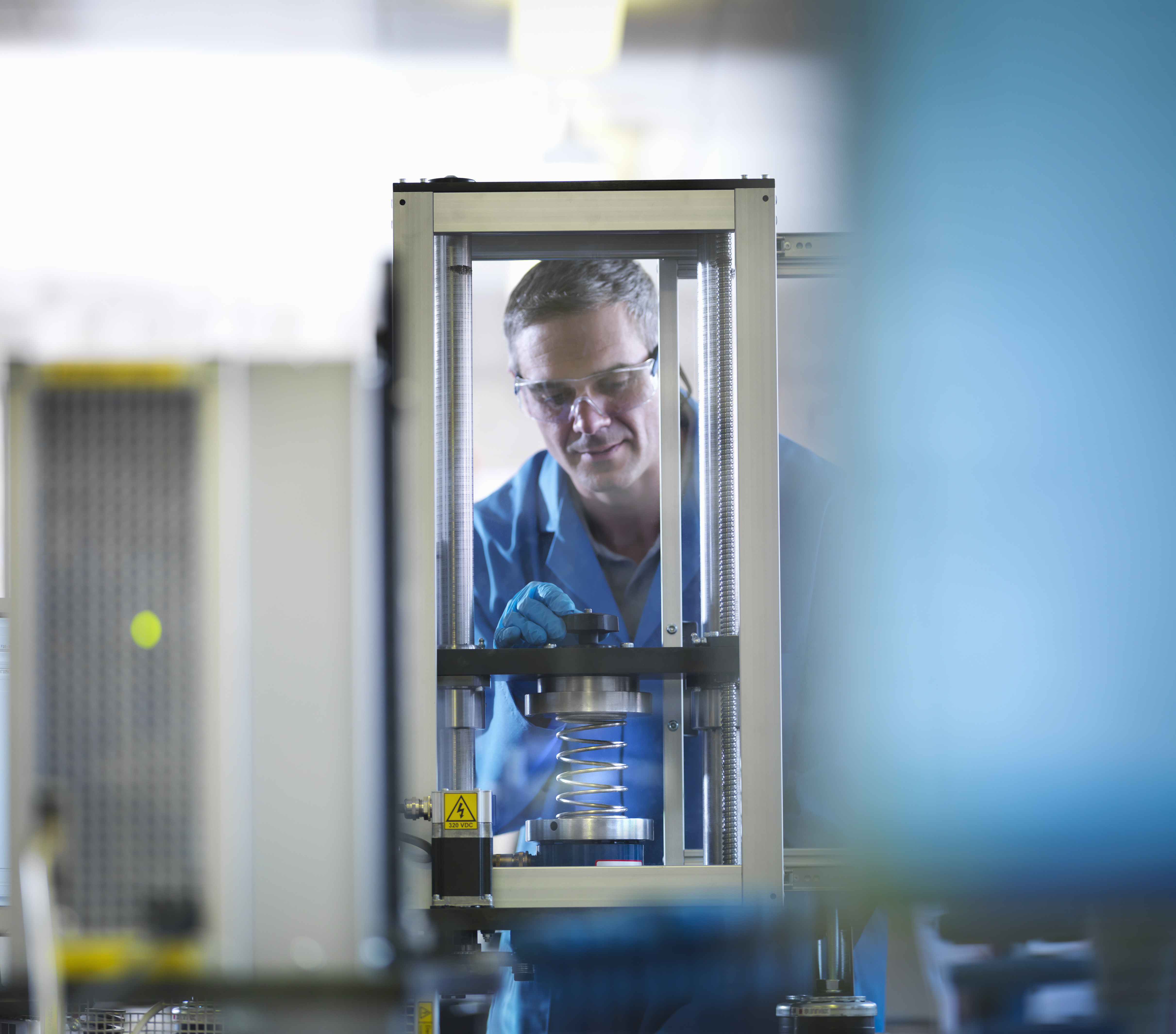 A man carrying out mechanical testing. 