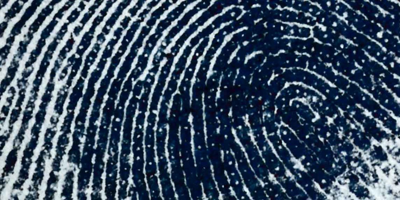 close up of a finger print on paper