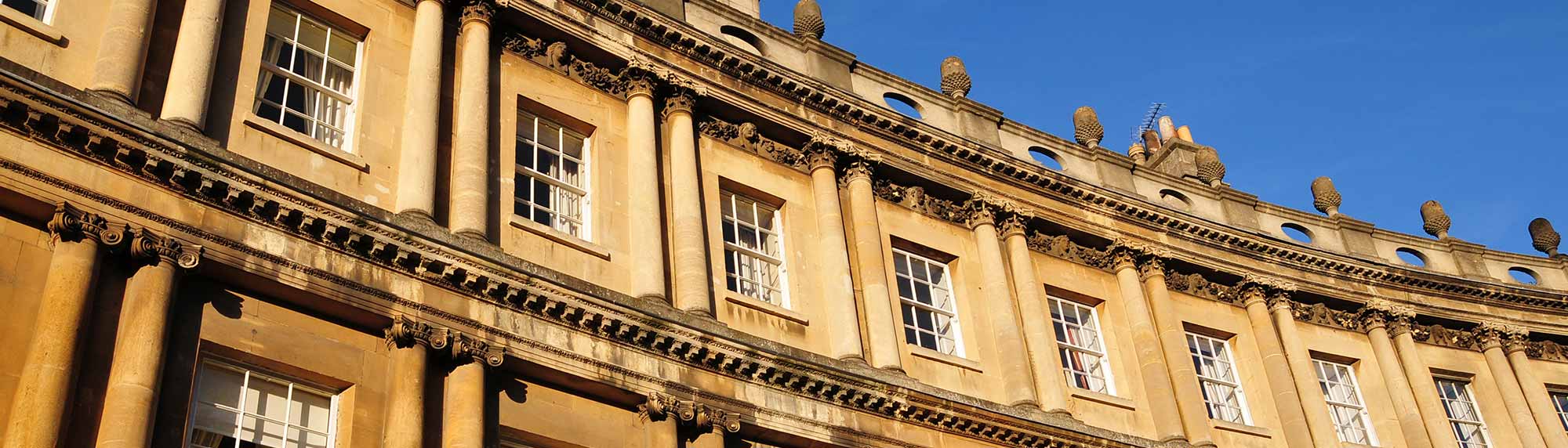 a row of windows on the first floor of a building