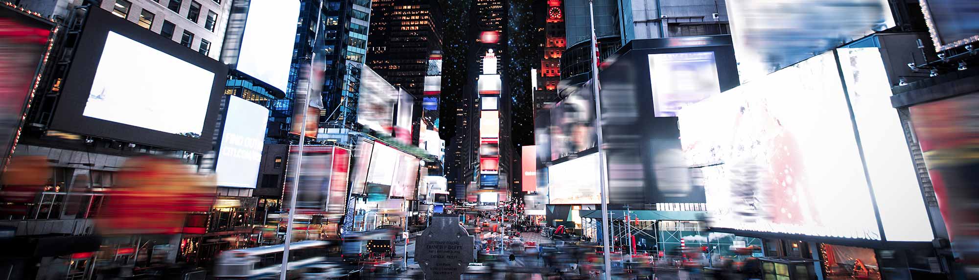 time square in new york with all advertising blurred out